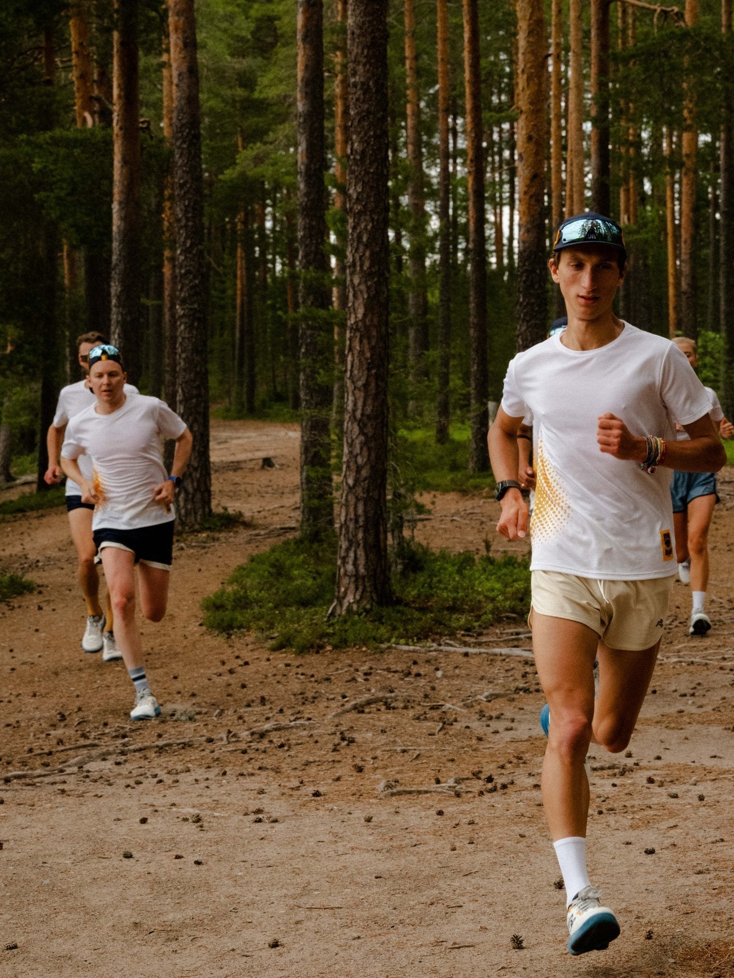 Group of runners running in the KARHU Ikoni 3.0 Sun Run edition